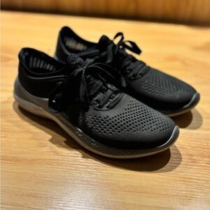 Women’s black Croc tennis shoes
